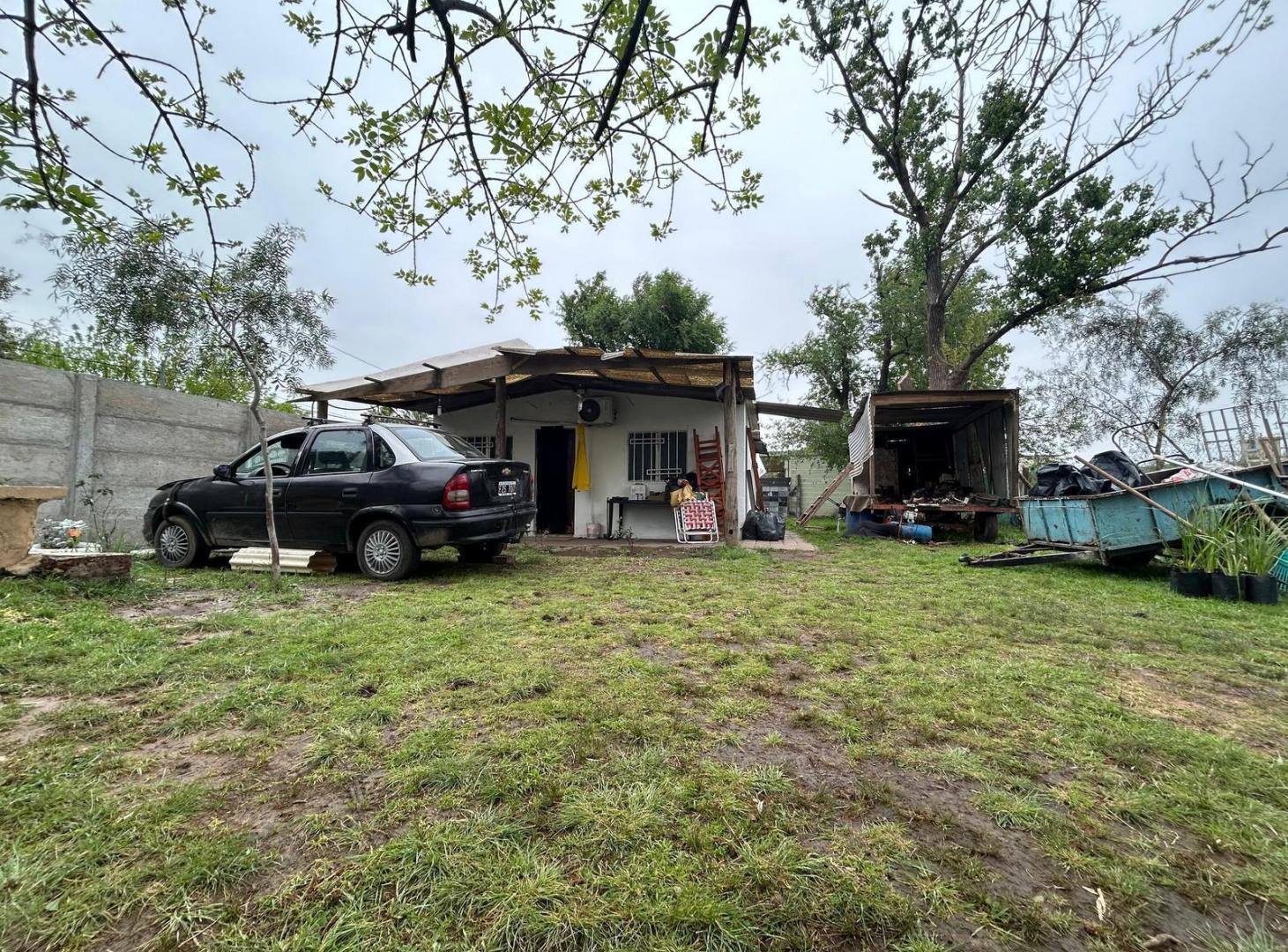 Foto de VENTA / PERMUTA – Terreno con casa de 2 dormitorios y pileta, imagen 2