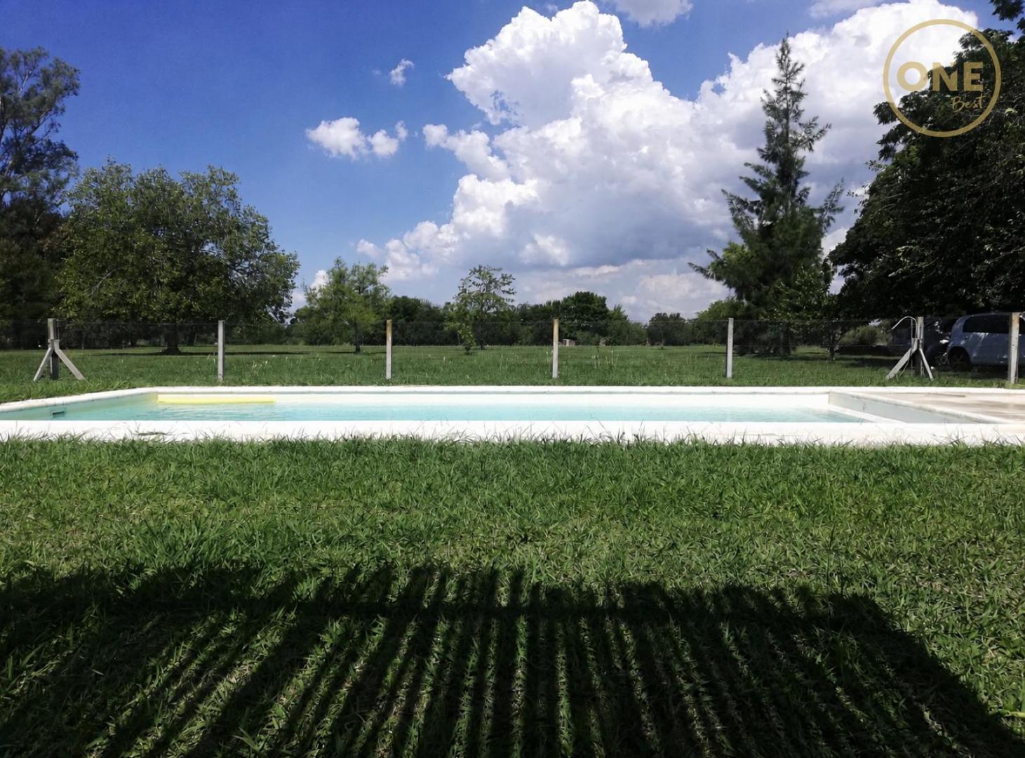 Foto de Campo de 2,2 ha en Arturo Seguí, calle 152 y 420, imagen 1