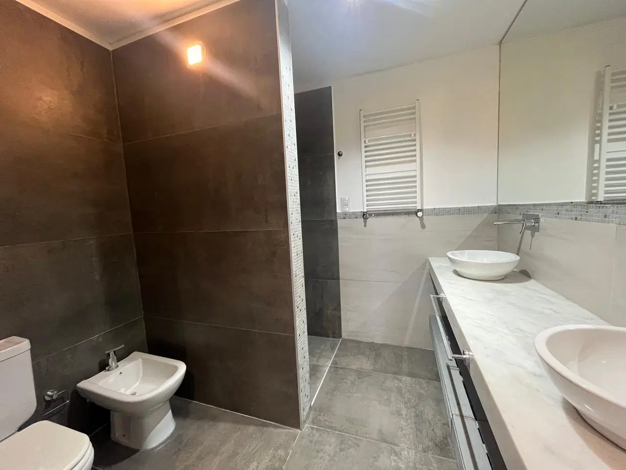 Departamento en Venta calidad premium, tres dormitorios con dos cocheras 2