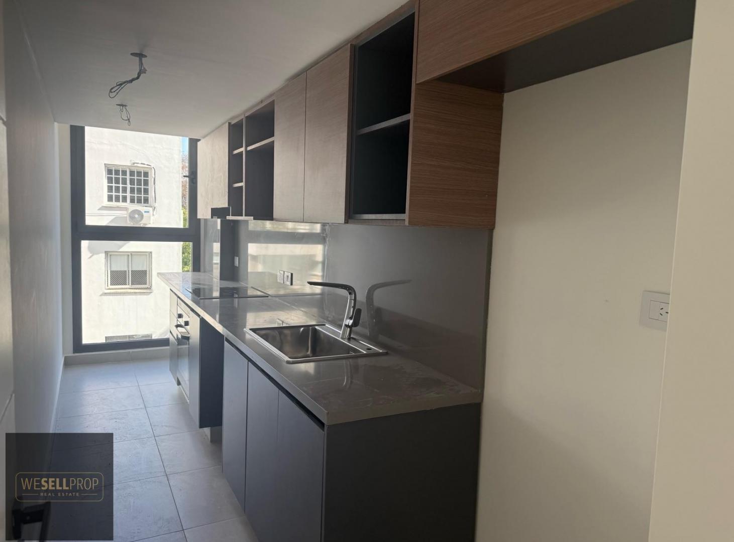 Foto de Venta de departamento dos ambientes con balcón y cochera en edificio a, imagen 4