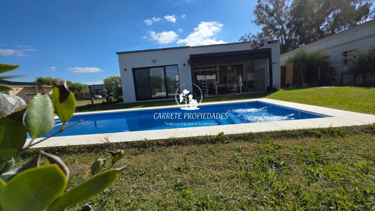 Foto de OPORTUNIDAD. Hermosa casa de 4 Ambientes y pileta. Barrio San Ramón, imagen 2