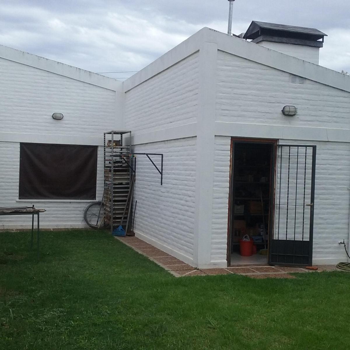 Casa con Posibilidades de Ampliación 4