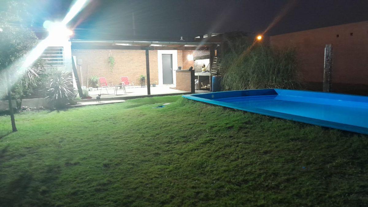 Foto de Venta casa con pileta y cochera - Chiara Lubich 330, Roldán, imagen 4