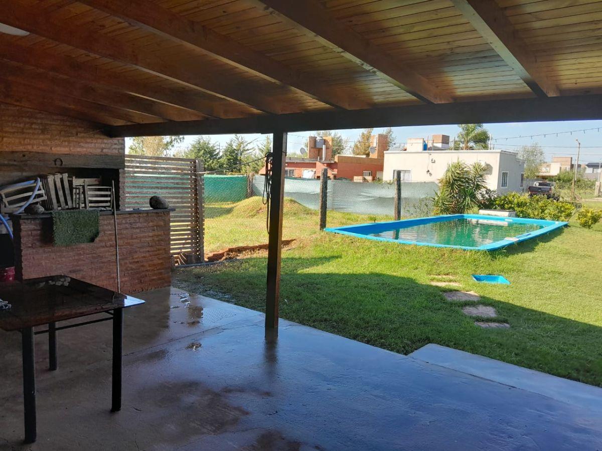 Foto de Venta casa con pileta y cochera - Chiara Lubich 330, Roldán, imagen 5