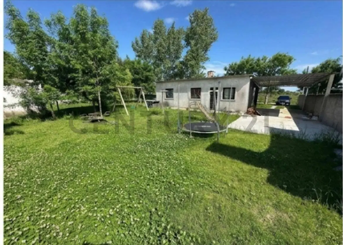 Venta casa en Barros Blancos, 590m2 . 2 dormitorios, cochera, parrillero 5