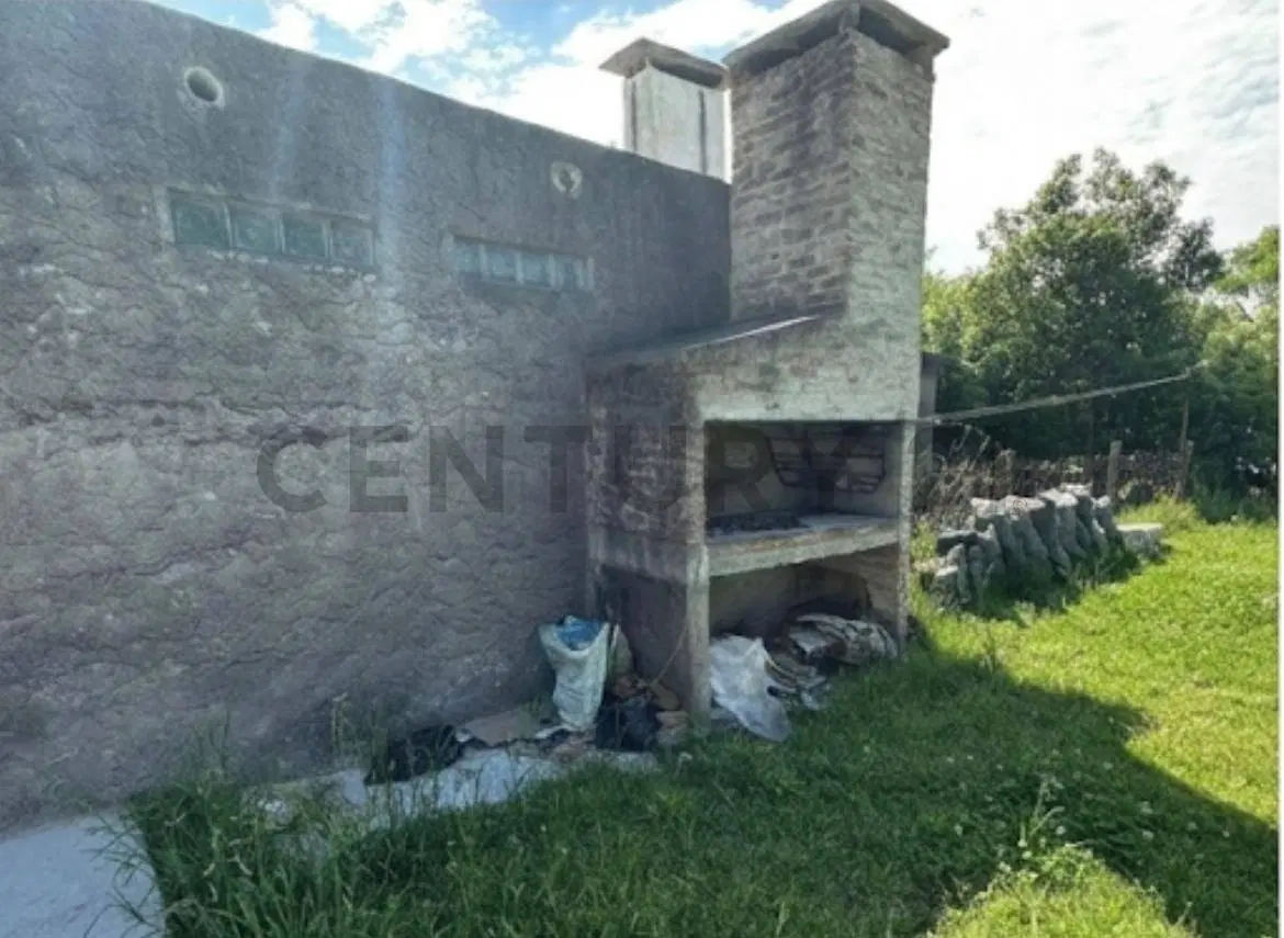Venta casa en Barros Blancos, 590m2 . 2 dormitorios, cochera, parrillero 8