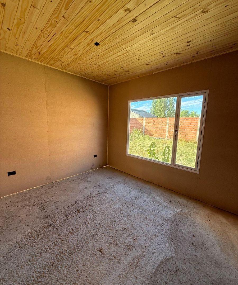 Foto de Terreno en Fernandez Oro con casa Prefabricada a terminar, imagen 2