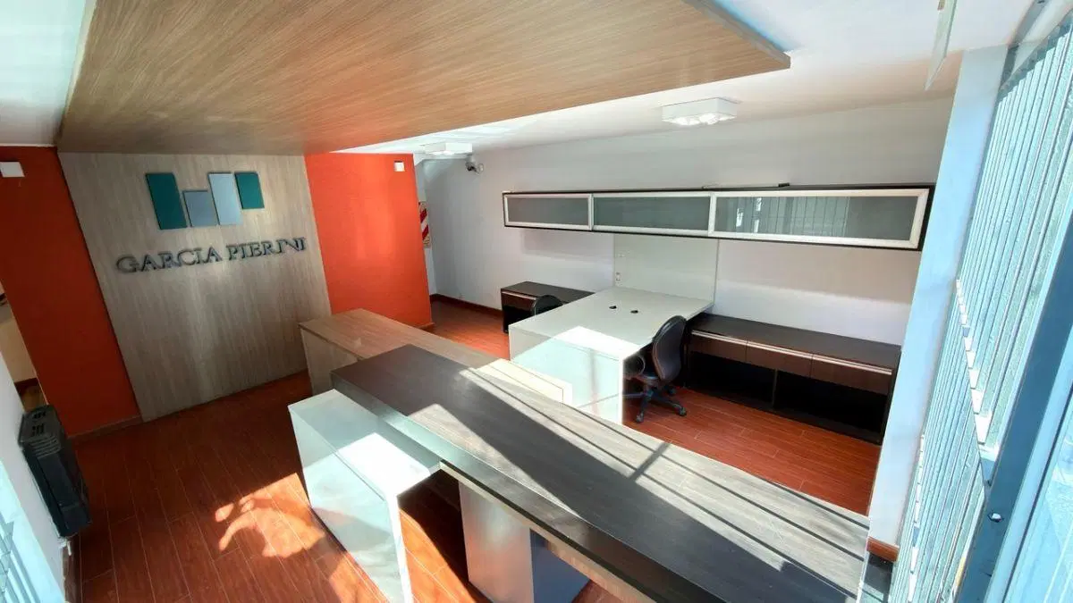 EDIFICIO CORPORATIVO OFICINA CON COCHERA EN GUEMES 5