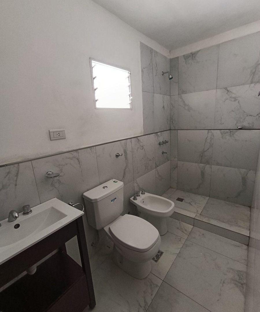 Foto de departamento 2 dormitorios y patio en planta baja, imagen 1