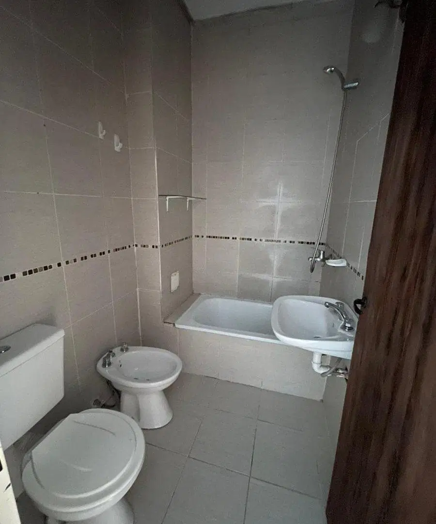 Depto 1 dormitorio c/patio zona Zanni y Almafuerte 8