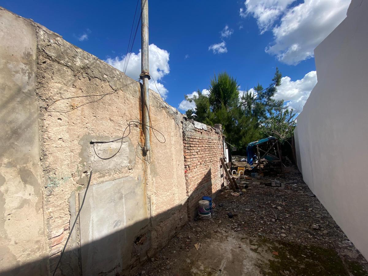 Foto de LOTE EN VENTA EN LOS HORNOS CON CASA A DEMOLER/REFACCIONAR, imagen 1