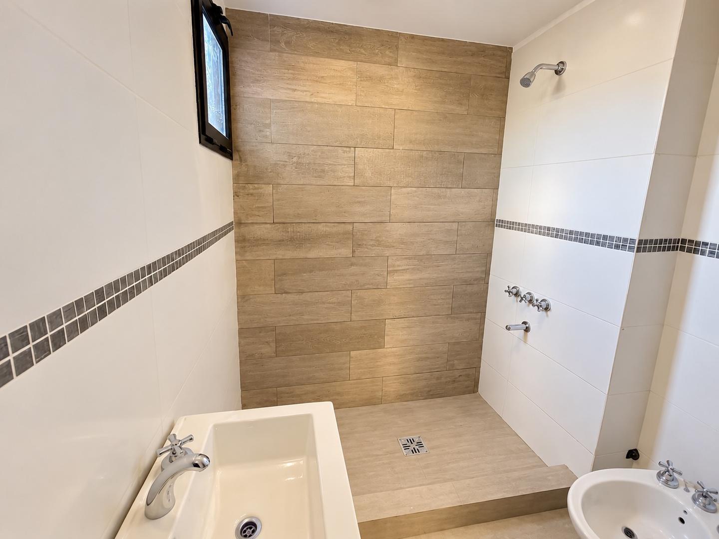 Foto de VENTA DEPARTAMENTO 2 AMBIENTES PLANTA BAJA CON PATIO MERLO, imagen 3