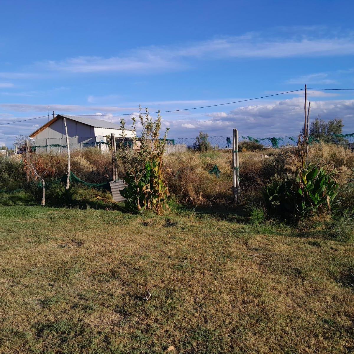 Terreno con Casa Prefabricada a Reciclar 1