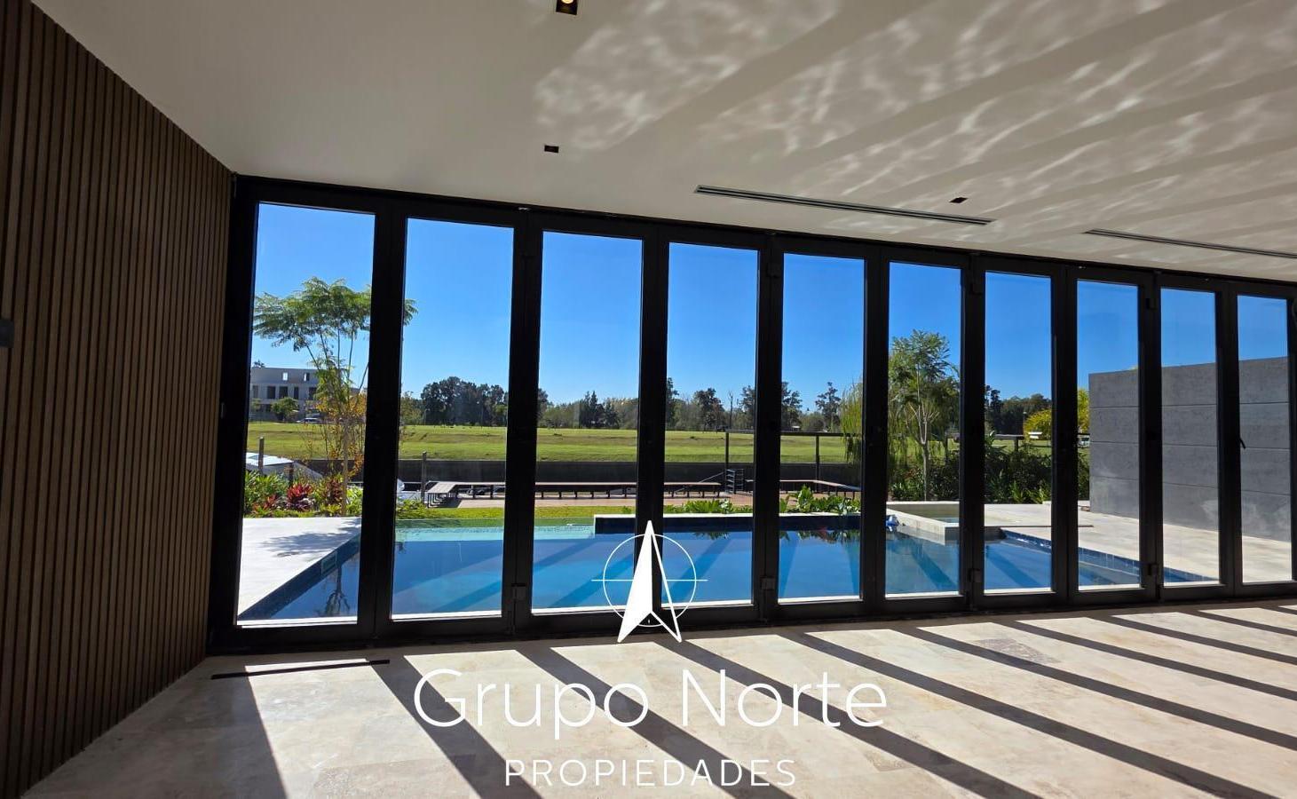 Foto de Casa en venta al rio en barrio El Yacht, Nordelta, imagen 1