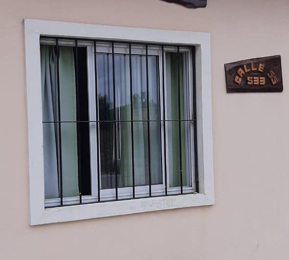 Casa Triplex con balcón UF1 al frente 2