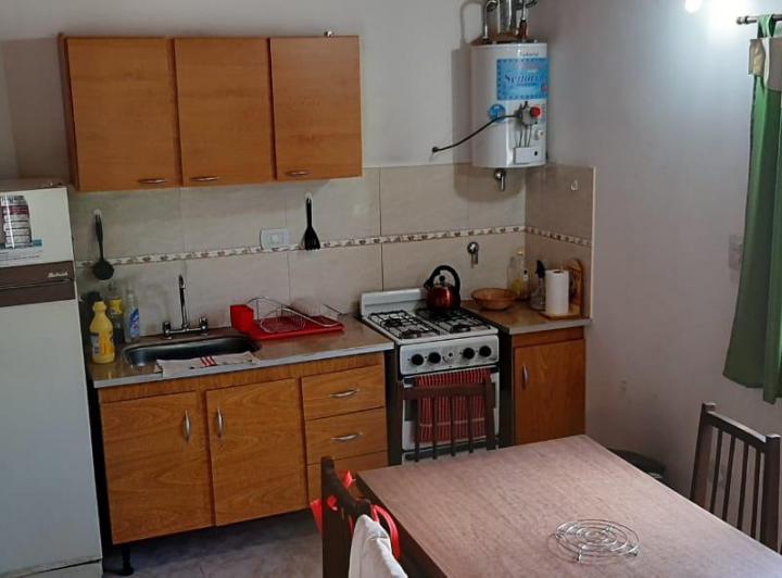 Casa Triplex con balcón UF1 al frente 1