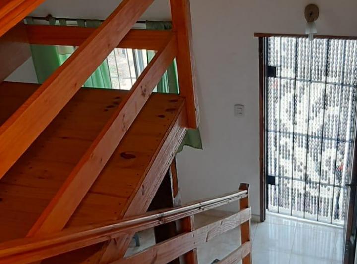 Casa Triplex con balcón UF1 al frente 3
