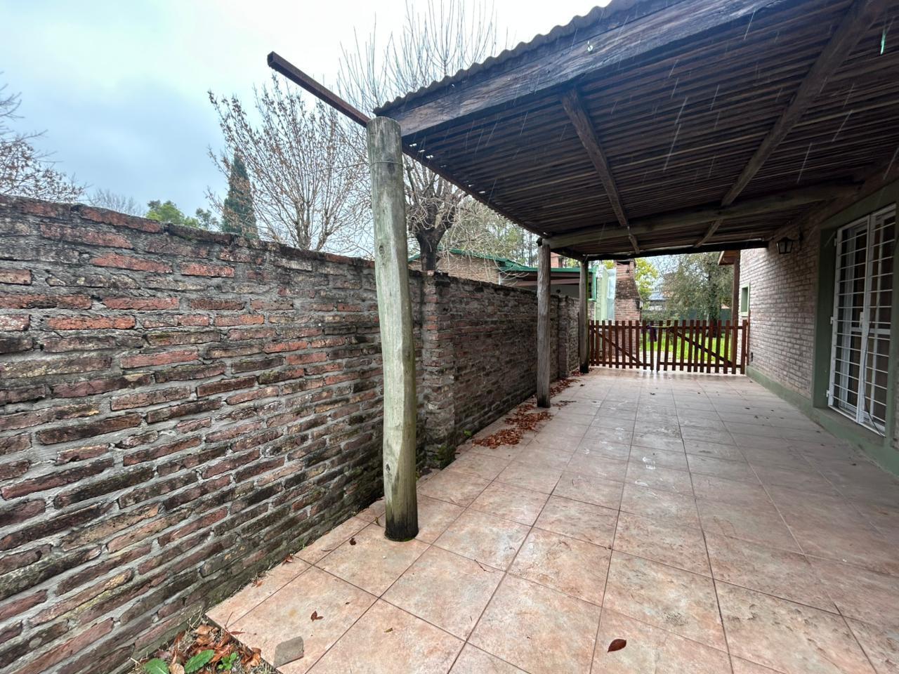 Foto de VENTA. CASA DE 2 DORMITORIOS - TERRENO DE 350M2. ROLDÁN, imagen 4