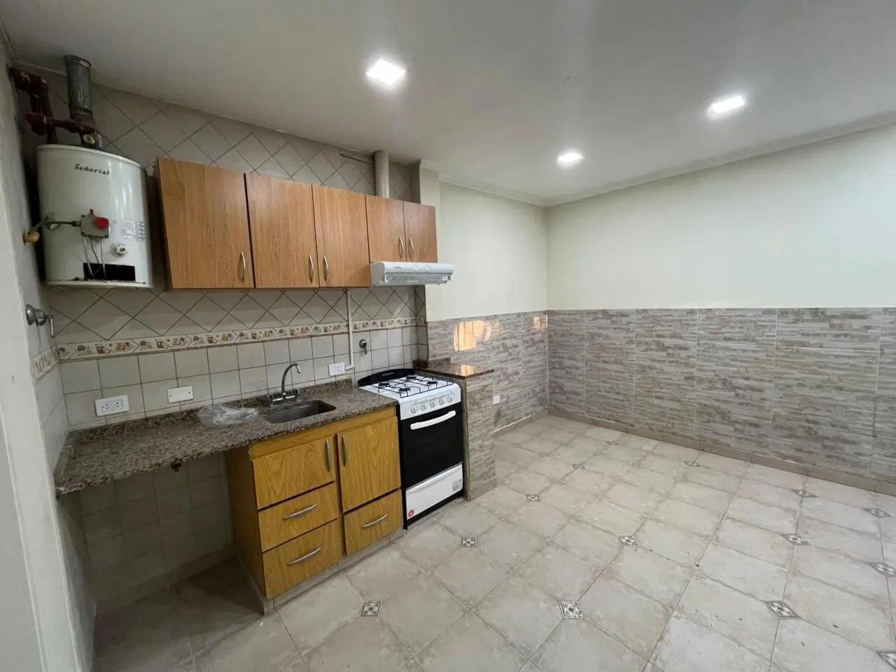Departamento dos ambientes en alquiler en Moreno centro 5