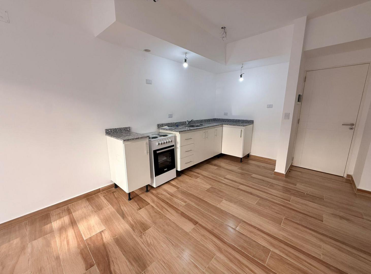 Departamento 3 ambientes a estrenar, con cochera y balcón, en venta en Paso del Rey
