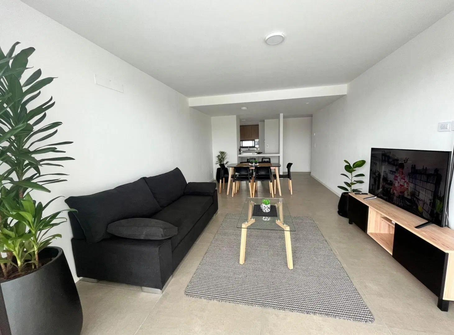 Departamento dos ambientes con cochera en venta en Playa Grande 5