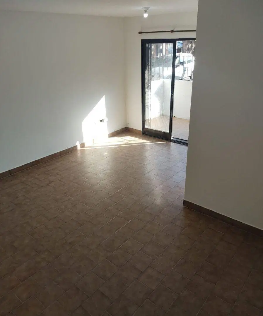 DEPARTAMENTO 2 DORMITORIOS COCHERA Y PATIO 8