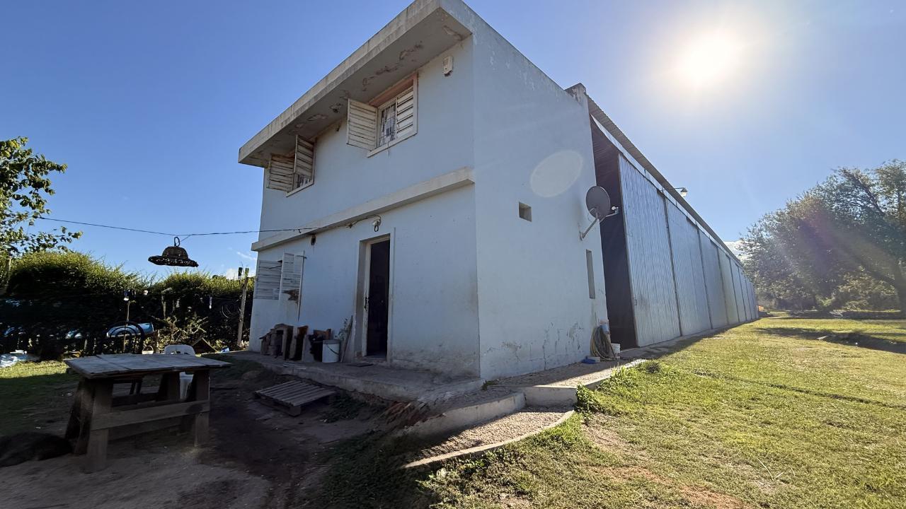 Terreno con galpon lanchera y  departamento  Potrero de Garay