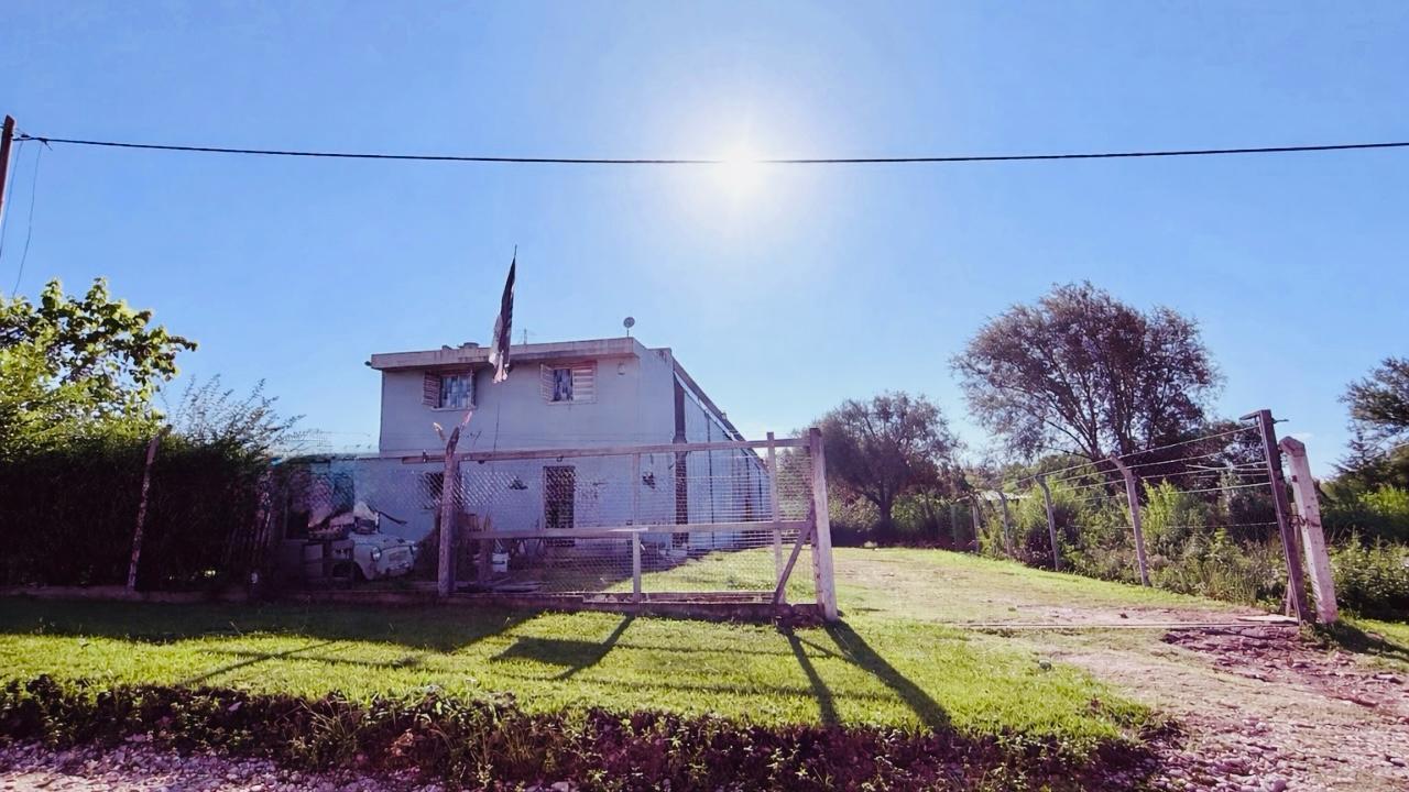 Terreno con galpon lanchera y  departamento  Potrero de Garay
