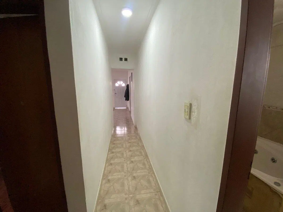 CASA 4 AMBIENTES EN VENTA CON LOCAL EN  BERISSO 5