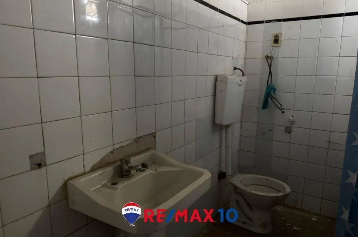 PROPIEDAD CON EXCELENTE POTENCIAL COMERCIAL 1