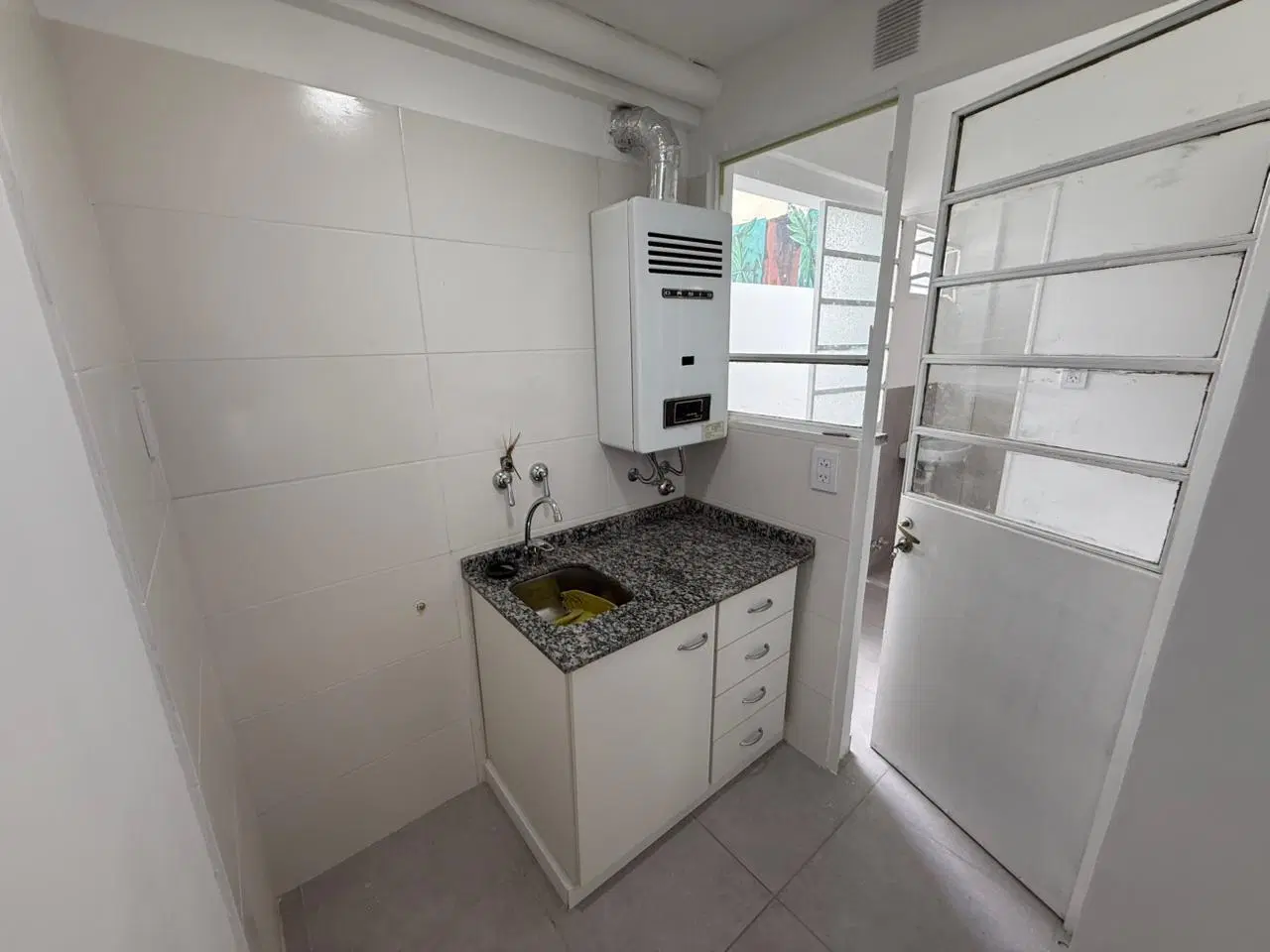 VENTA - DEPARTAMENTO TRES DORMITORIOS CON COCHERA - MARTIN 4