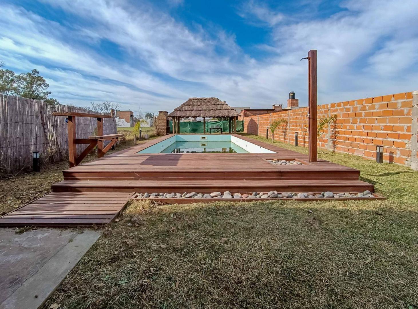 Foto de VENTA/PERMUTA - CASA 3 DORMITORIOS CON PILETA Y COCHERA - Luis, imagen 2