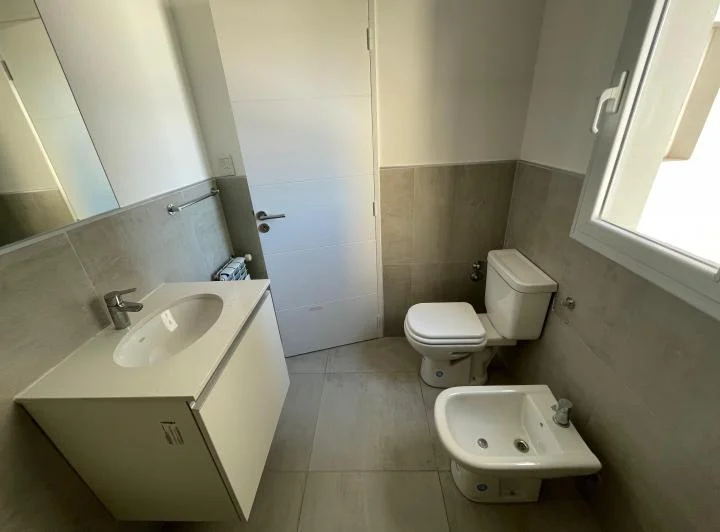 Departamento céntrico de 1 dormitorio y cochera en Cipolletti 4