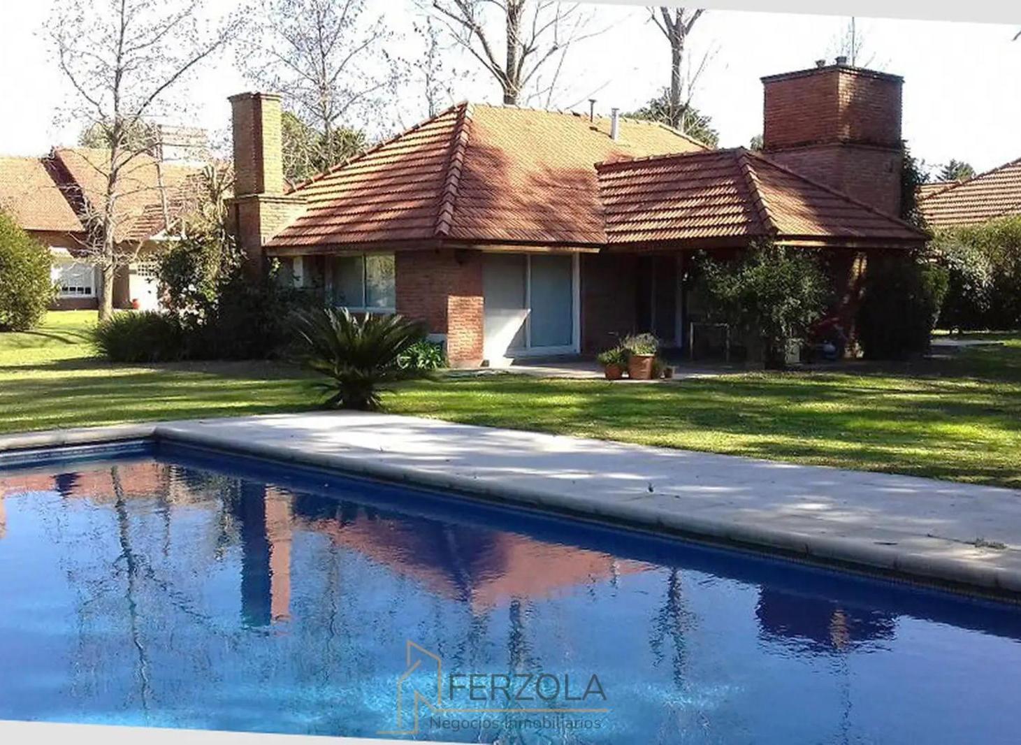 Foto de Casa en venta con piscina en Country Club Los Cardales, imagen 1