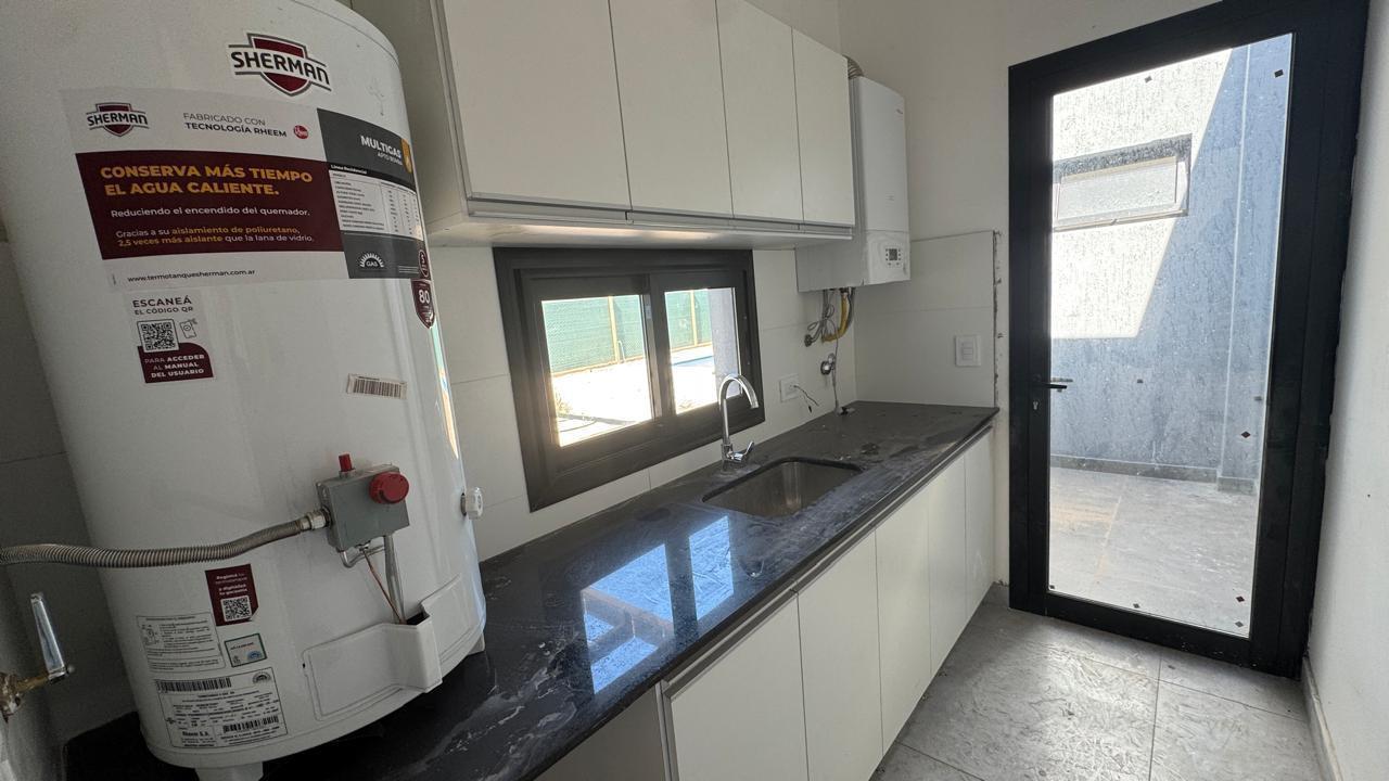 Foto de VENDE CASA A ESTRENAR EN NAUTILUS barrio privado - APTA CREDITO, imagen 2