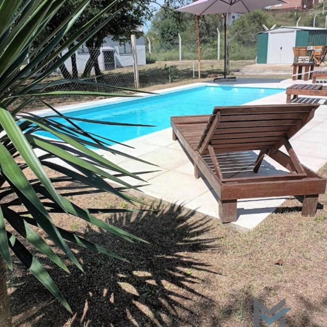 Foto de Casa con pileta exclusiva en Tanti, alquiler temporario, imagen 3