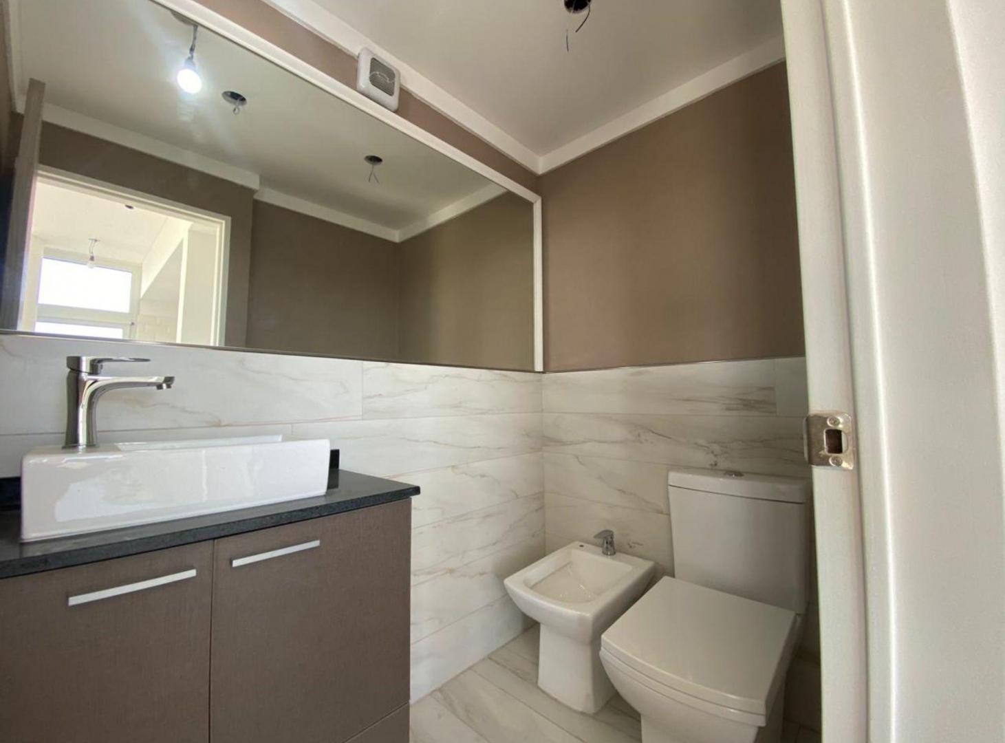 Foto de VENTA 3 AMB. A ESTRENAR CON COCHERA - LOMAS CENTRO, imagen 5