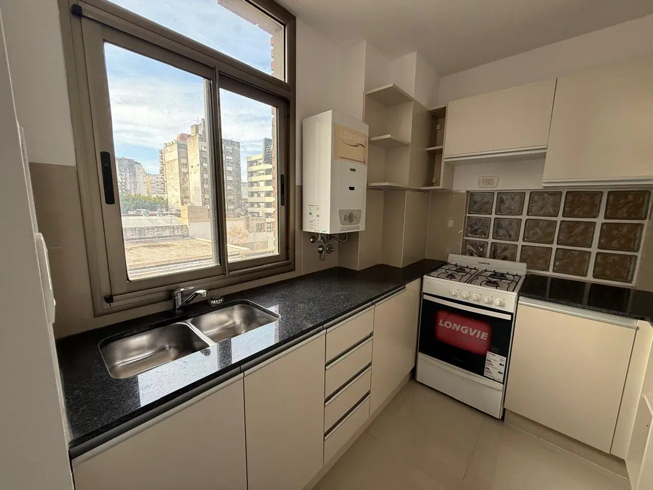 Venta departamento, 2 dormitorios, centro. 5