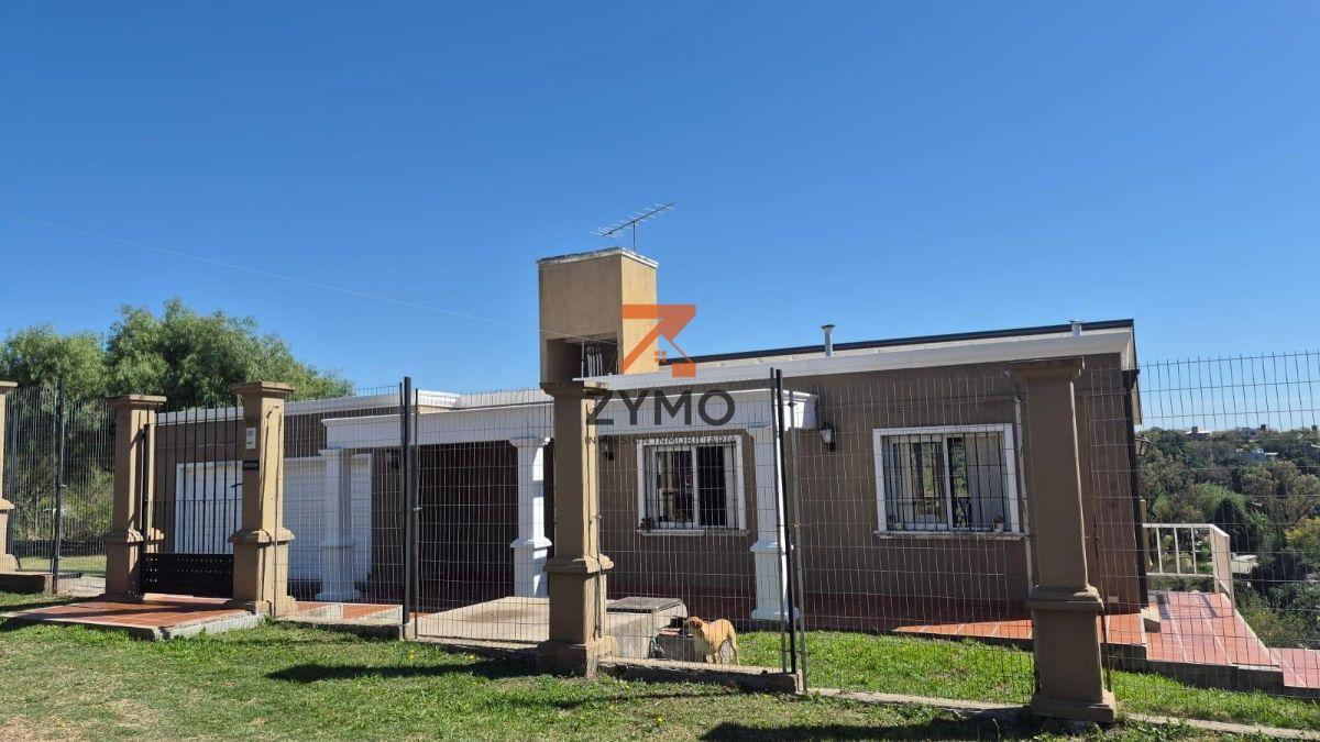 Foto de VENTA CASA 4 DORMITORIOS 3 BAÑOS 4 COCHERAS EN MENDIOLAZA, imagen 4