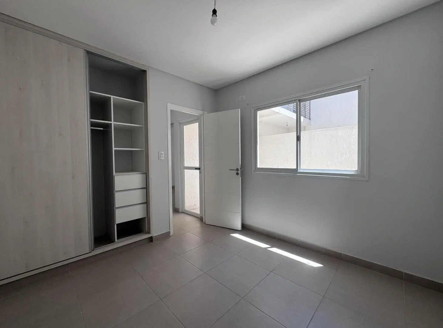 Departamento en Venta - 2 dormitorios con patio y cochera 5