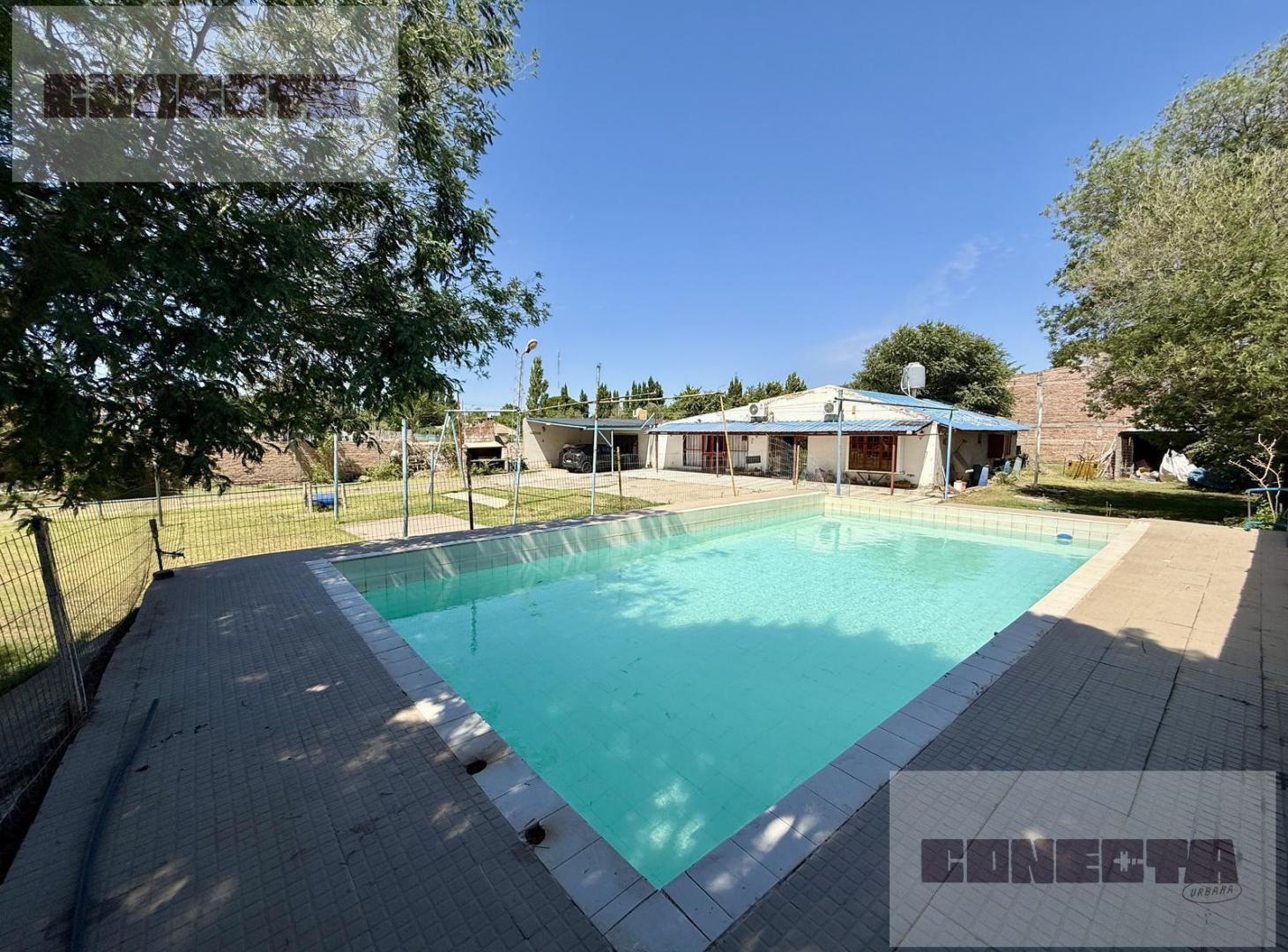 Foto de VENTA DE CASA CON QUINCHO Y PILETA EN PLOTTIER, NEUQUÉN, imagen 1