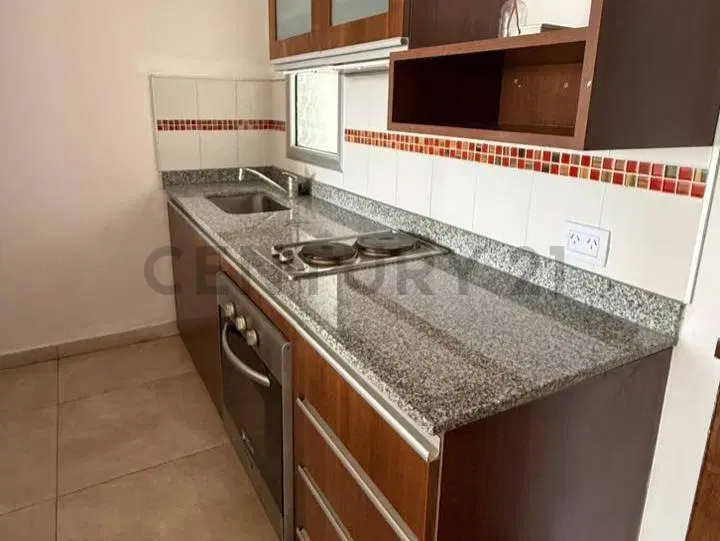Departamento de 1 Dormitorio con cochera En Alquiler 2
