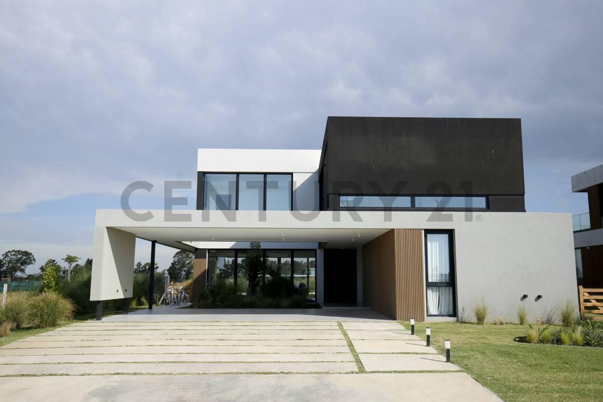 Foto de CASA EN VENTA EN PUERTO NIZUC - 4 DORMITORIOS+ESCRITORIO - QUINCHO, imagen 1