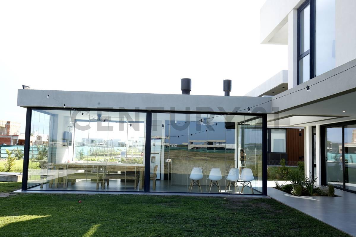 Foto de CASA EN VENTA EN PUERTO NIZUC - 4 DORMITORIOS+ESCRITORIO - QUINCHO, imagen 3