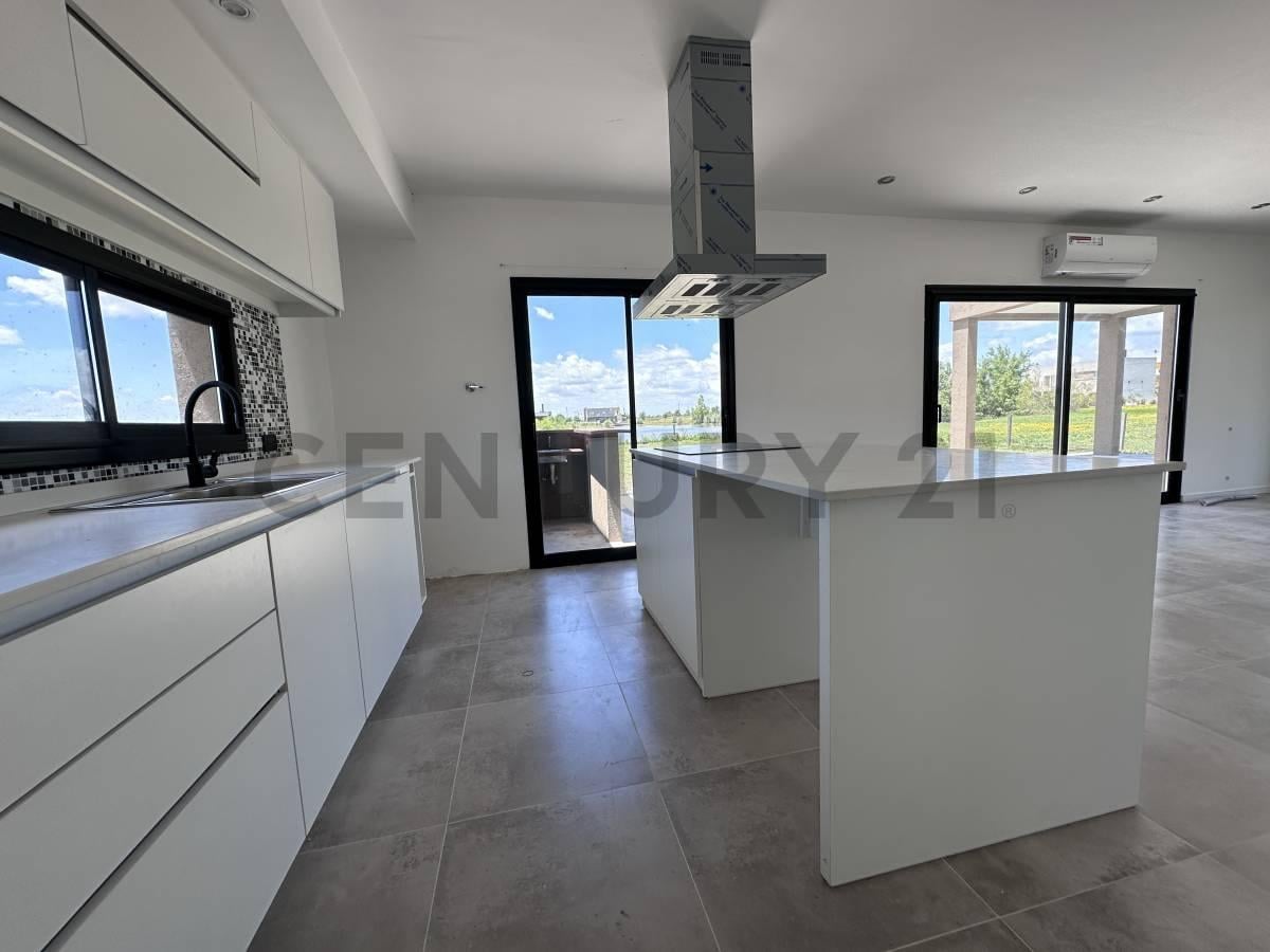 Foto de Casa en venta a la laguna en Hudson Magallanes, Pueblos del Plata, imagen 5