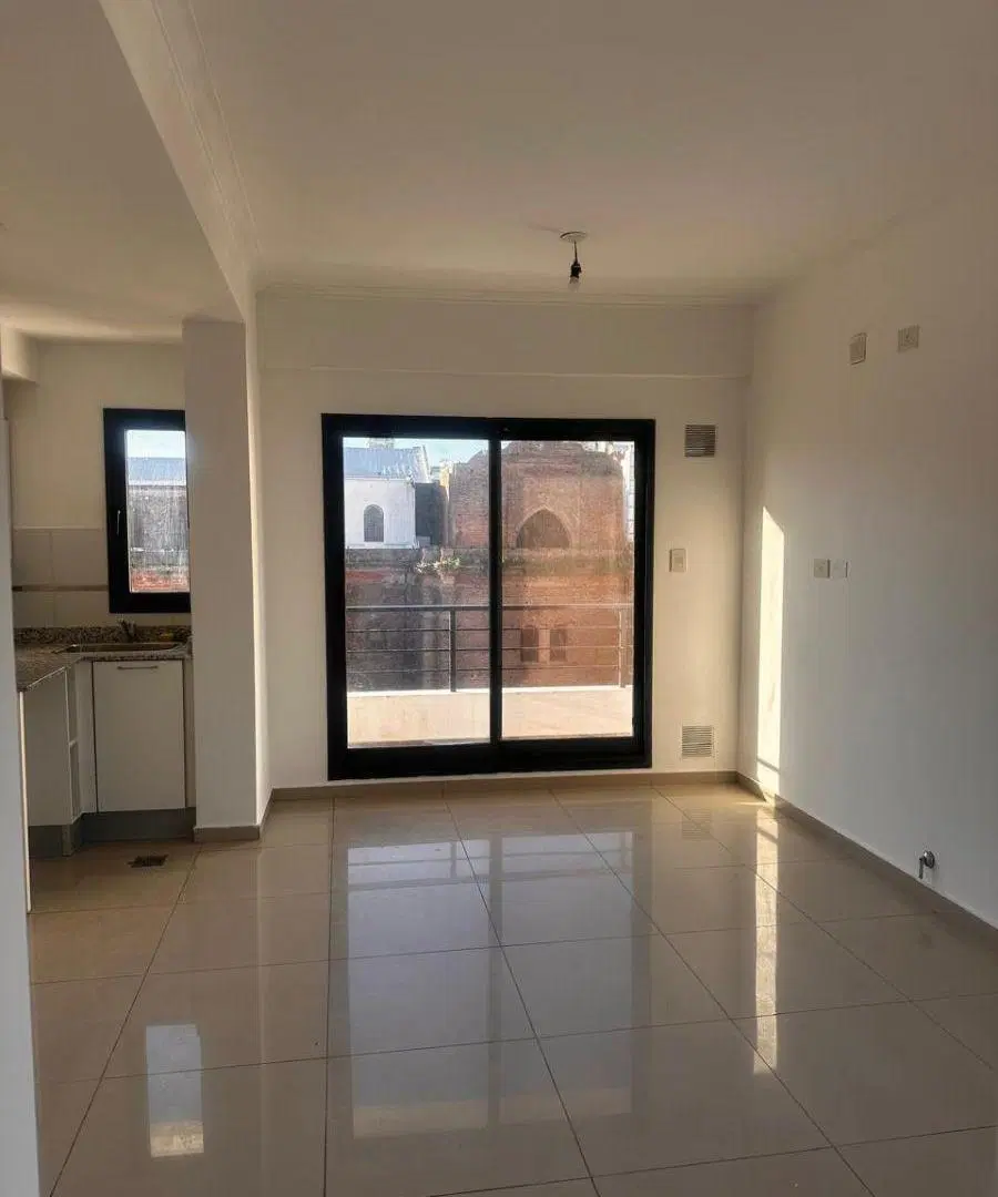 DEPARTAMENTO CENTRICO DOS DORMITORIOS Y COCHERA 5