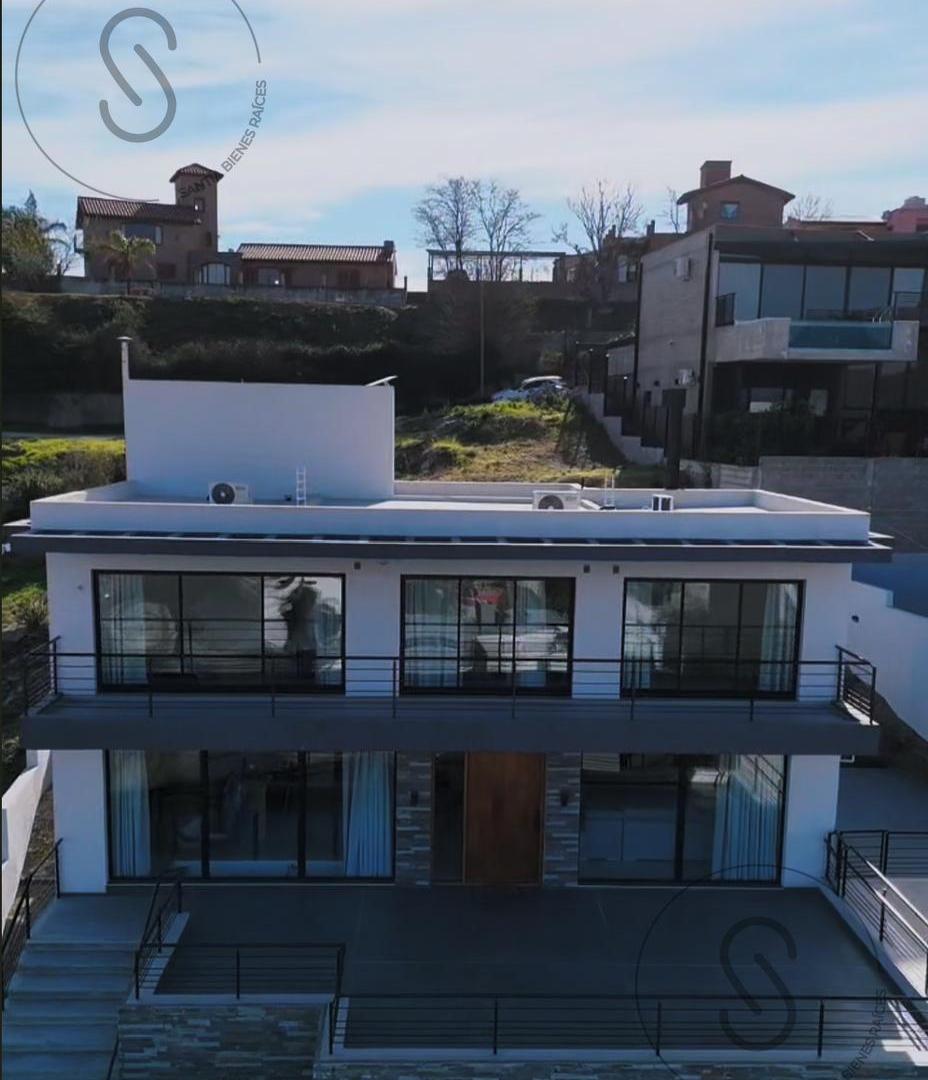 Foto de VENTA CASA 3 DORMITORIOS CON PILETA- BECCIU EN VILLA CARLOS PAZ, imagen 2