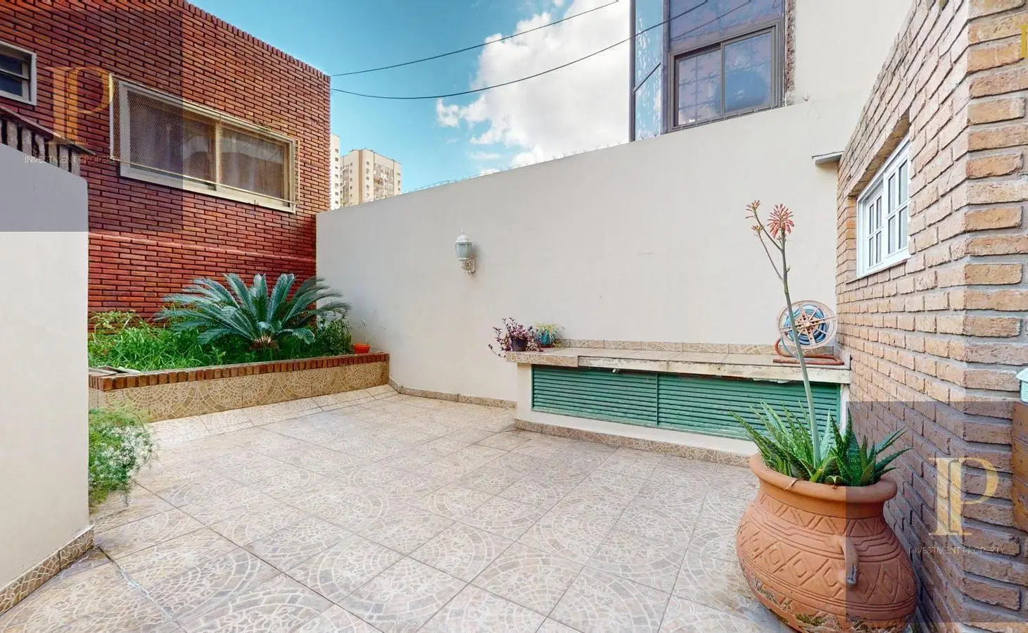 Venta departamento 4 ambientes con patio y cocheras en Avellaneda centro 5