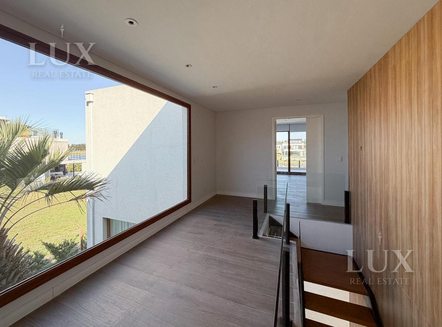Foto de Casa en venta con 4 habitaciones a la laguna en Los Puentes, Nordelta, imagen 3