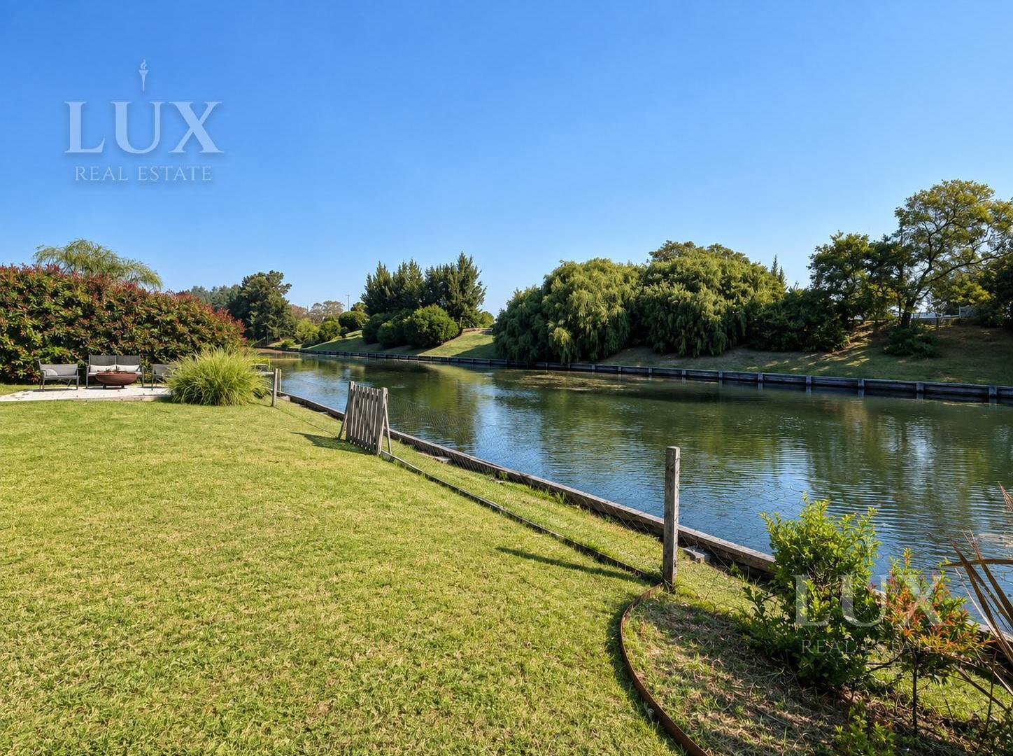 Foto de Casa en venta con salida a la laguna en el Barrio El Golf, Nordelta, imagen 4